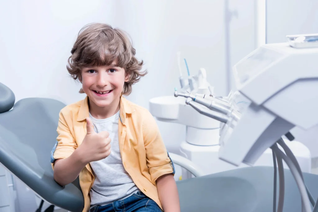 Kid smiling after visiting a Dentist near Mamaroneck NY