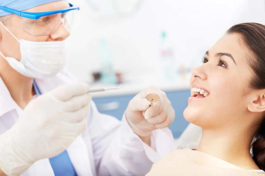 Girl having periodontal treatment by Gentle Touch Dentistry