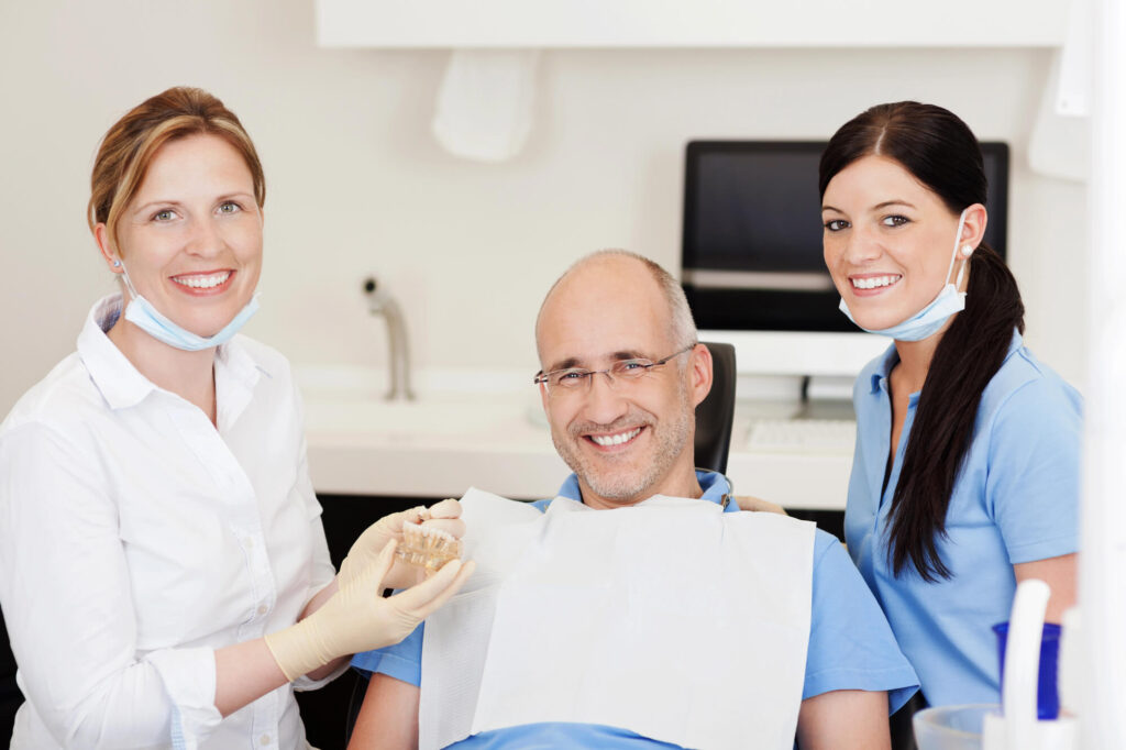 Man smiling after getting Dental implants Mamaroneck NY