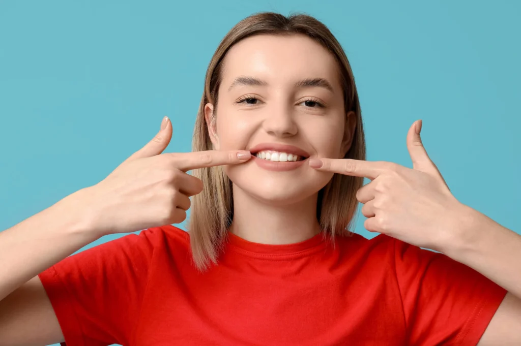 Woman smiling after gum treatment at Gentle Touch Dentistry