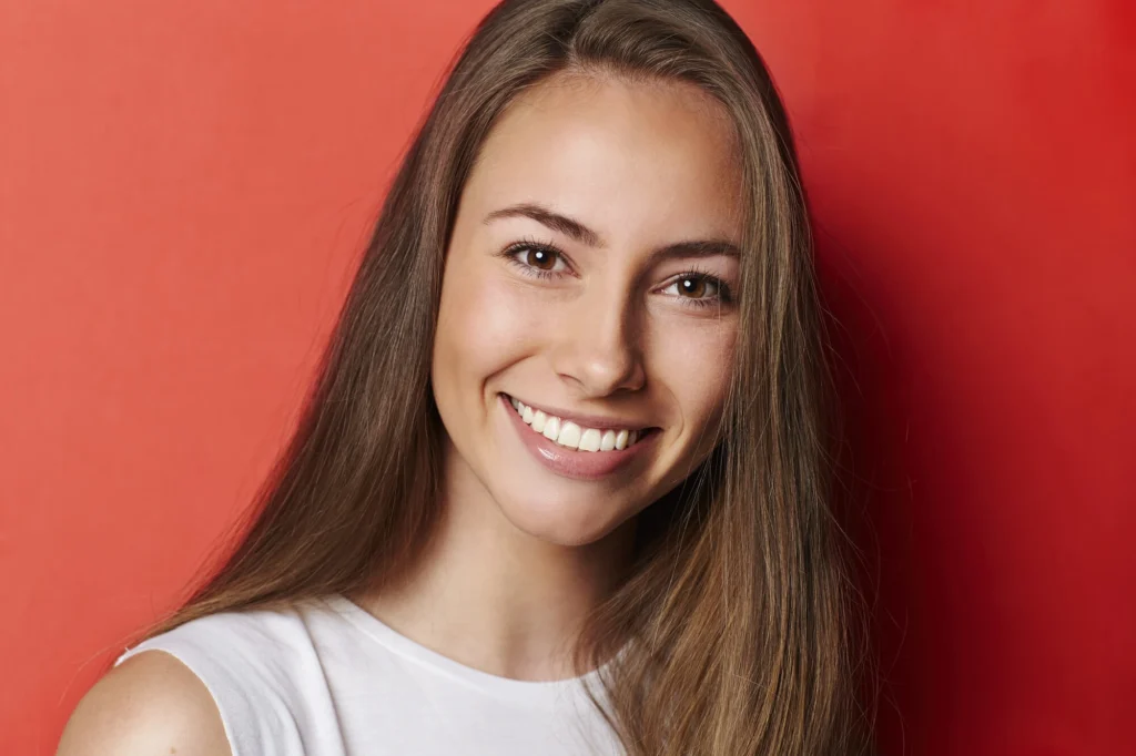 Woman smiling with Porcelain veneers Harrison NY