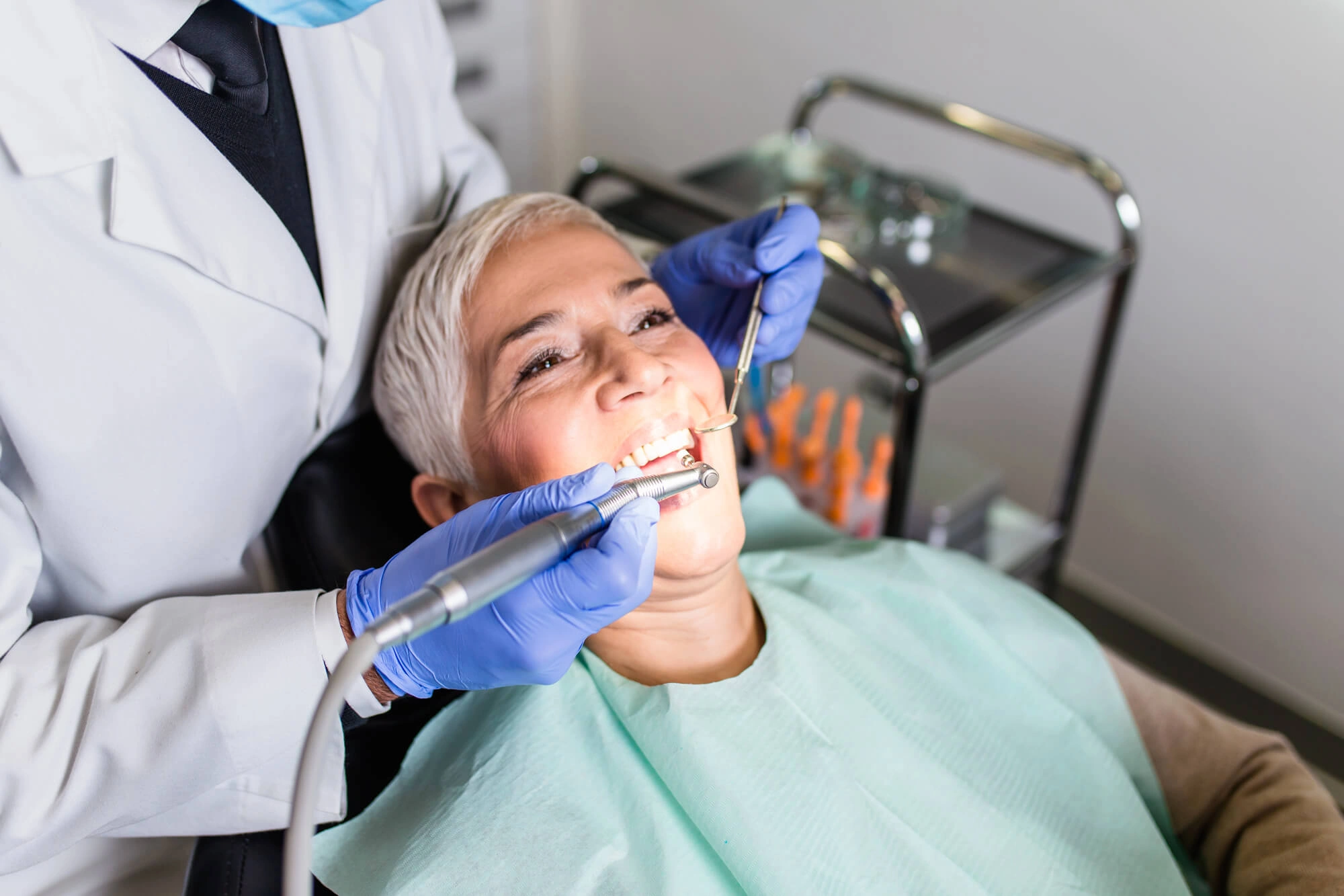 Woman with healthy teeth undergoing Dental implants Harrison NY